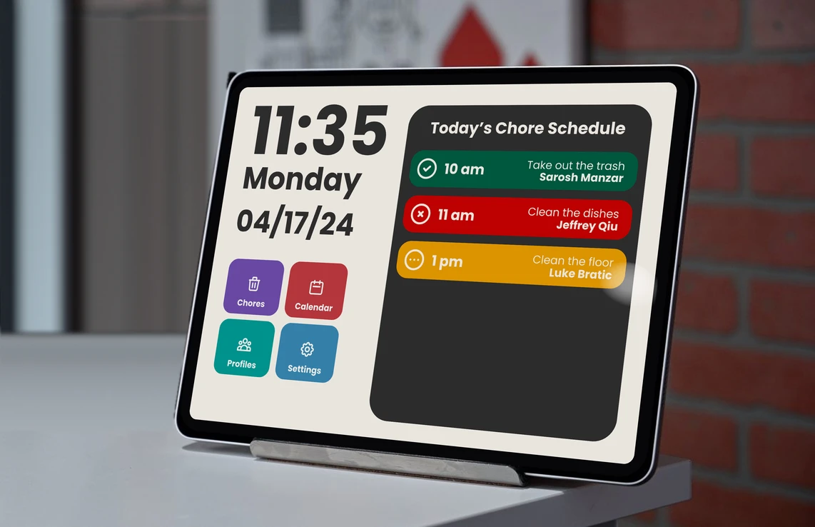 The Hudson hub running on an iPad in a stand on a shelf, showing the time and date, buttons for chores, calendar, profiles, and settings, and today's chore schedule with each task color-coded.